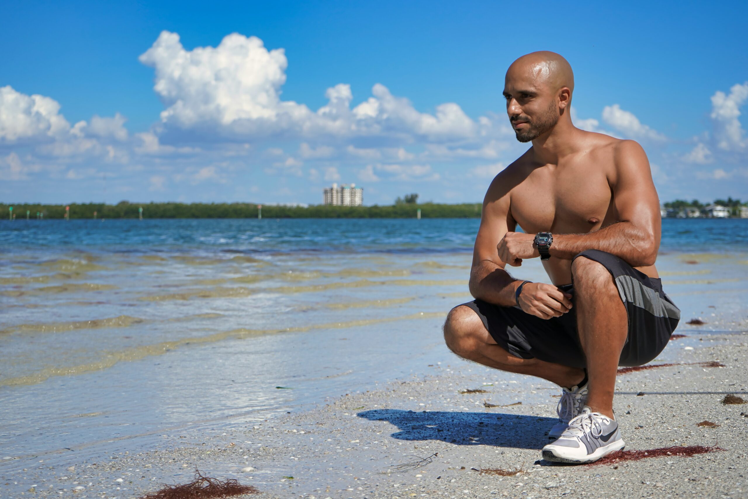 Man Sitting At Beach